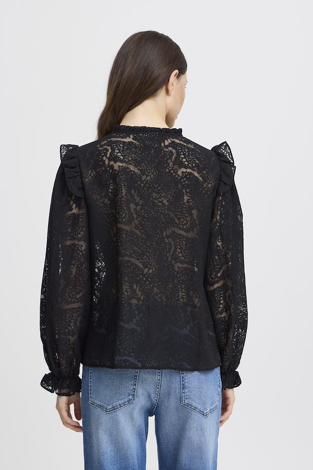 Sheer printed black button front top featuring ruffled shoulders and cuffs.