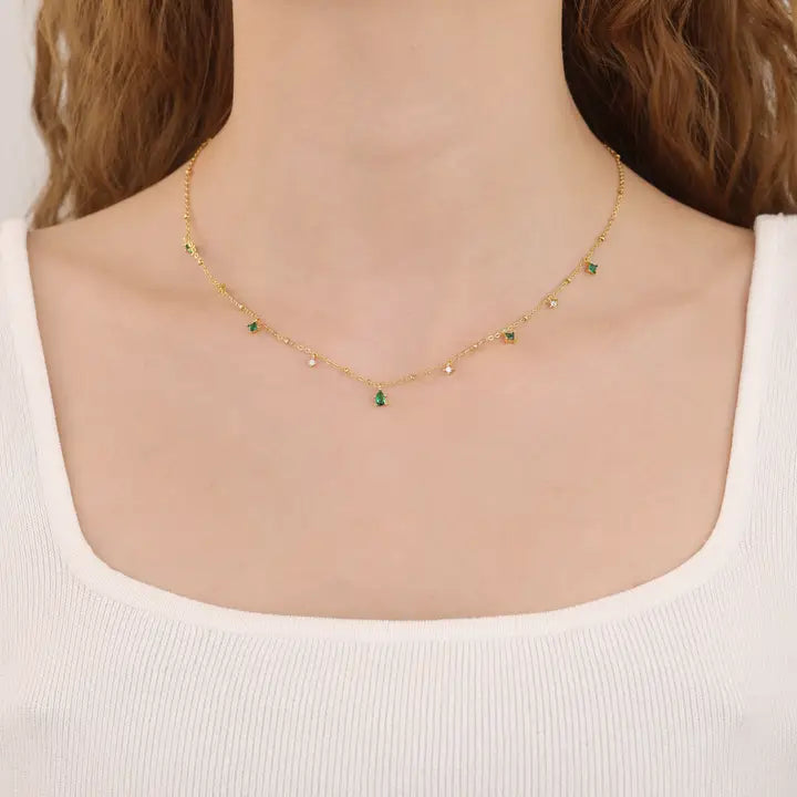 dainty emerald quality cubic zirconia on a gold chain necklace 