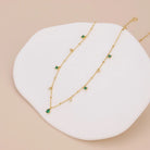 dainty emerald quality cubic zirconia on a gold chain necklace 