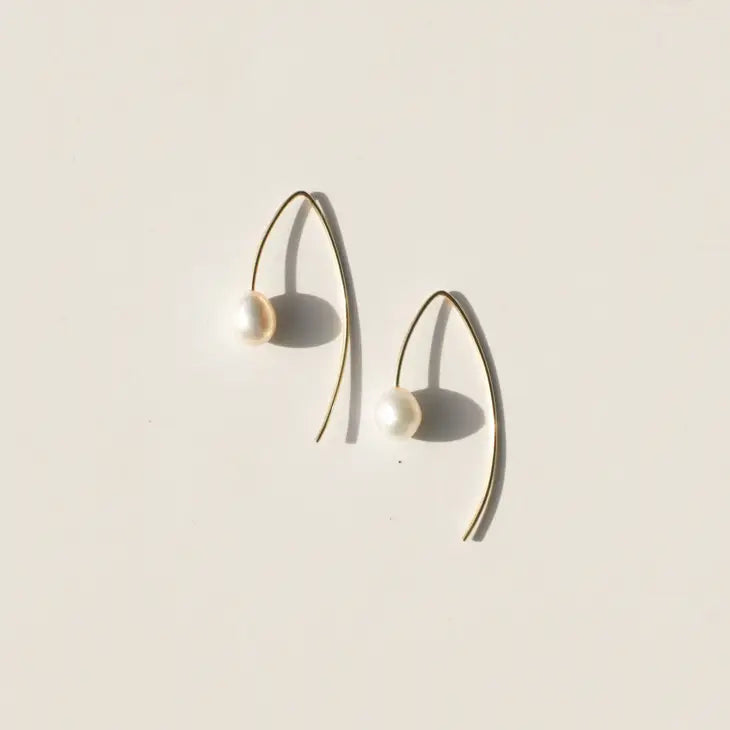 Thick thread wrapped open hoop earrings featuring faux leather snakeskin  details. Approximately 2